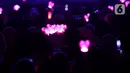 Taeyeon terlihat anggun dengan pakaian berwarna hitam, senada dengan rambut panjangnya yang terurai lurus. Dia membuka pertunjukan dengan INVU, lagu hit dari album berjudul INVU yang dirilis pada 2022, yang kemudian disambut euforia menggelora dari penggemar. (Liputan6.com/Helmi Fithriansyah)