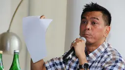 Anggota DPRD DKI Mohamad Sanusi saat menjadi pembicara dalam dikusi bertajuk 'Deadlock Ahok' di kawasan Cikini, Jakarta, Sabtu (7/3/2015). (Liputan6.com/Helmi Afandi)