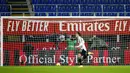 Penyerang Juventus, Federico Chiesa, melakukan selebrasi usai mencetak gol ke gawang AC Milan pada laga Liga Italia di Stadion San Siro, Rabu (6/1/2021). Juventus menang dengan skor 3-1. (AP/Antonio Calanni)