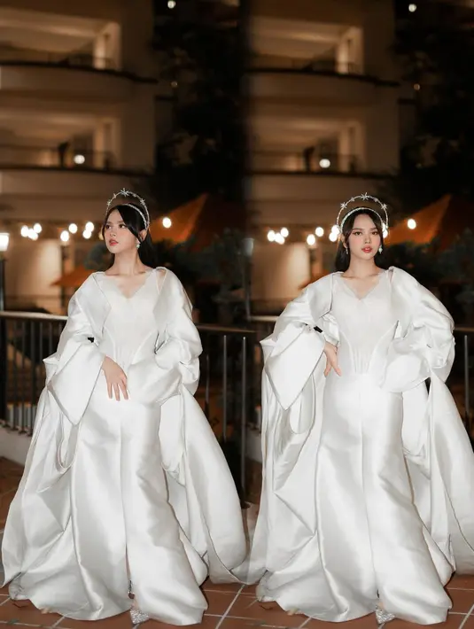 Lyodra tampil super cantik bak dewi dalam balutan gaun putih dengan detail outer yang mengembang di bagian lengannya. [Foto: Instagram/lyodraofficial]