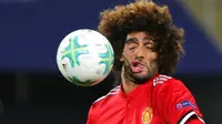 Gelandang Manchester United Marouane Fellaini beraksi saat menghadapi Real Madrid pada Piala Super Eropa 2017 di Philip II Arena, Skopje, Selasa (8/8/2017). (AP Photo/Boris Grdanoski)