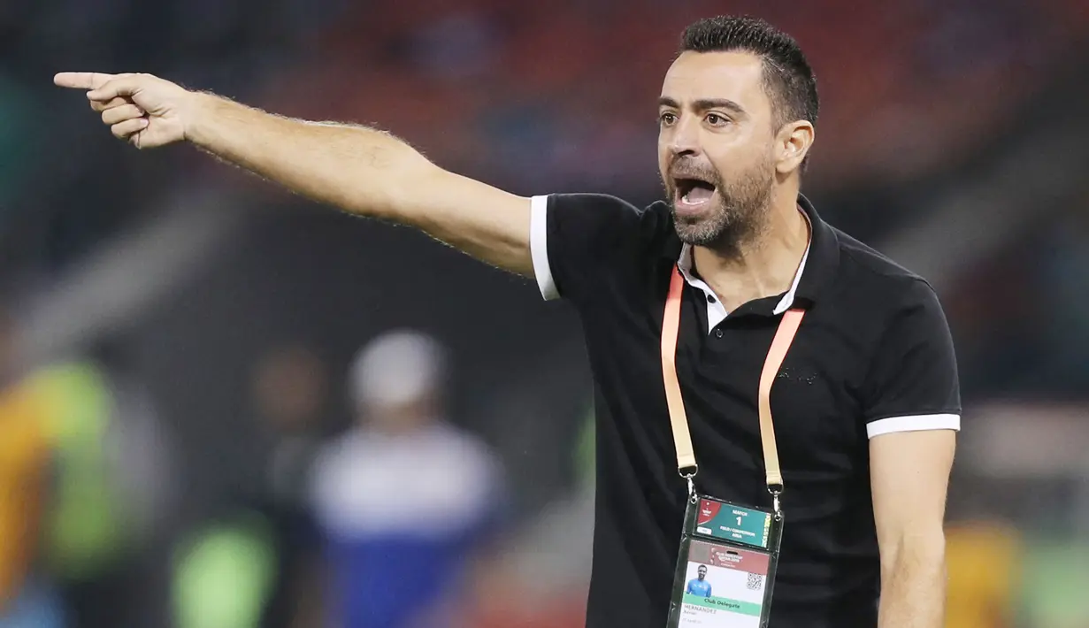 Xavi Hernandez - Legenda Barcelona ini sudah sejak lama diinginkan manajemen Blaugrana untuk mengisi kursi pelatih. Sejauh ini, prestasi Xavi sebagai pelatih juga cukup mentereng yakni dengan mempersembahkan empat trofi untuk Al Sadd. (AFP/Karim Jaafar)