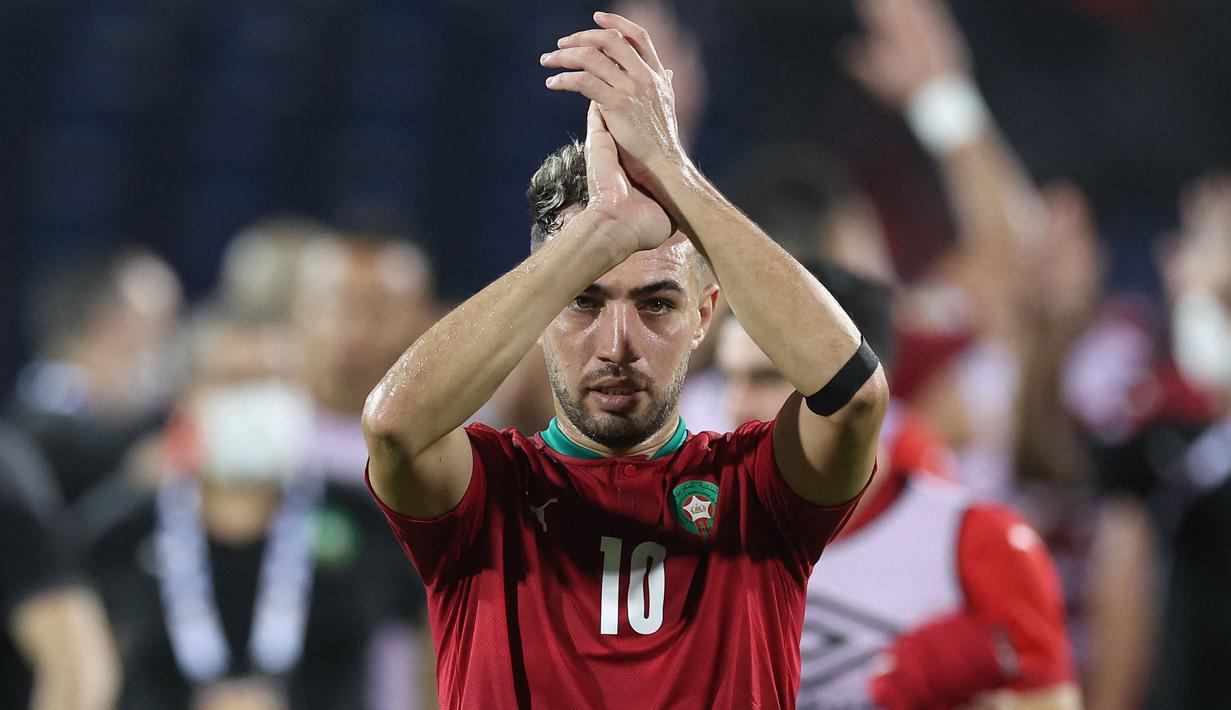 Dilahirkan di El Escorial, Spanyol, Munir El Haddadi memiliki garis keturunan Maroko dari sang ayah. Sempat melakoni debut bersama Timnas Spanyol pada 8 September 2014, ia akhirnya memutuskan pindah membela Timnas Maroko yang akhirnya direstui FIFA lewat aksi banding ke Pengadilan Arbitrase Olahraga (CAS) pada 2021. Hingga kini ia telah tampil dalam 11 laga bersama Timnas Maroko sejak melakukan debut pada 26 Maret 2021. (AFP/Kenzo Tribouillard)