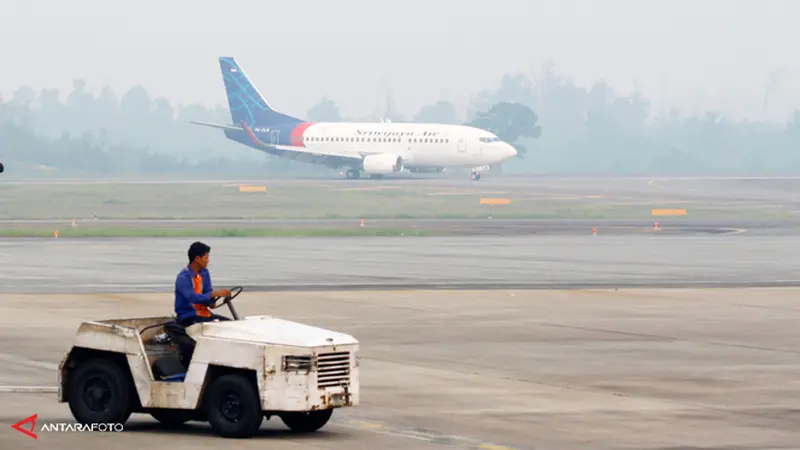 kabut-asap-bandara-130625-b.jpg