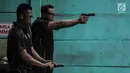 Pasukan Paspampres mengikuti kejuaraan menembak Paspampres Shooting Championship 2018 di Jakarta, Jumat (9/2). Kejuaran tersebut memperingati Hari Bhakti ke-72, Pasukan Pengamanan Presiden (Paspampres). (Liputan6.com/Faizal Fanani)