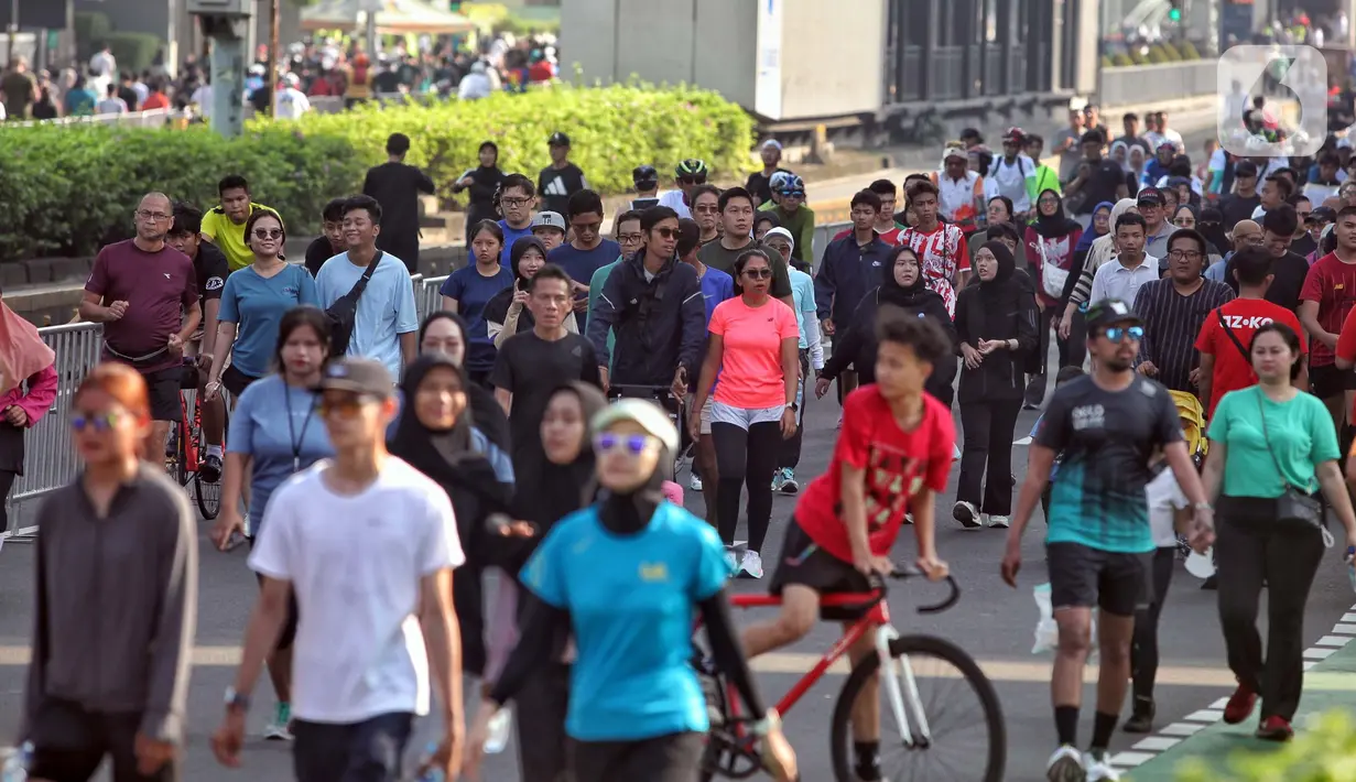 Untuk diketahui, Hari Bebas Kendaraan Bermotor atau car free day (CFD) merupakan program menurunkan kendaraan bermotor dari kesadaran penduduk dunia mengenai bahaya pemanasan global. (Liputan6.com/Angga Yuniar)