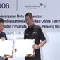 Penandatanganan MoU penyelenggaraan kredit pembiayaan melalui aplikasi online TMRW Pay Bank UOB Indonesia dan PT Garuda Indonesia Tbk (GIAA), Rabu (11/5/2022 (Liputan6.com/Gagas Y.G)