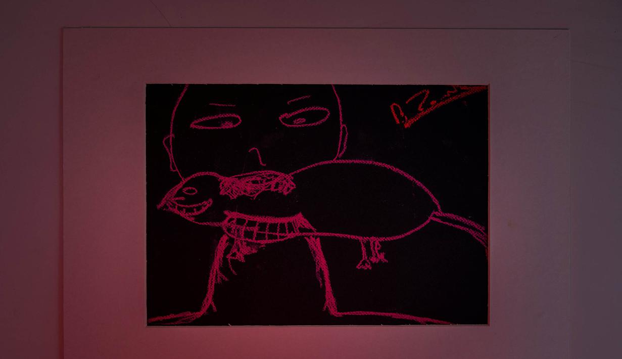 Foto lukisan seorang tentara yang sedang menjalani perawatan di pusat kesehatan mental di Pusat Rehabilitasi Nasional Unbroken di Lviv, Ukraina Barat, pada 18 September 2023. (Roman PILIPEY/AFP)