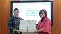 Ki-ka: Direktur Layanan dan Jaringan BNI Adi Sulistyowati, Direktur Eksekutif Manajemen Pelaksana Denni Puspa Purbasari melakukan MoU terkait Program Kartu Pra Kerja di Jakarta, Jumat (20/3).