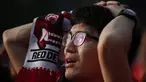 Ekspresi kekecewaan seorang warga Korea Selatan usai tim negaranya dikalahkan Belgia 0-1, Seoul, Jumat (27/6/14). (REUTERS/Kim Hong-Ji)