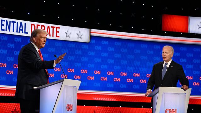 Presiden Joe Biden dan mantan Presiden Donald Trump terlihat saat debat calon presiden (capres) yang disiarkan CNN di Atlanta pada 27 Juni 2024. (Will Lanzoni/CNN)