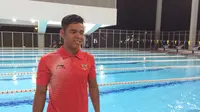 Perenang Indonesia, Zaki Zulkarnaen, berniat memberangkatkan kedua orang tuanya untuk Umrah dengan menggunakan bonus Asian Para Games 2018. (Bola.com/Zulfirdaus Harahap)