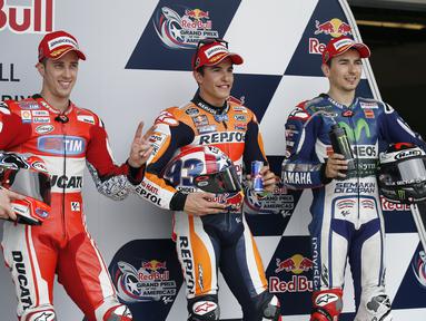 Andrea Davizioso, Marc Marquez, dan Jorge Lorenzo merupakan tiga pebalap yang bakal start terdepan di Circuit of The Americas (COTA), Minggu (12/4/2015). (AP Photo/Tony Gutierrez) 