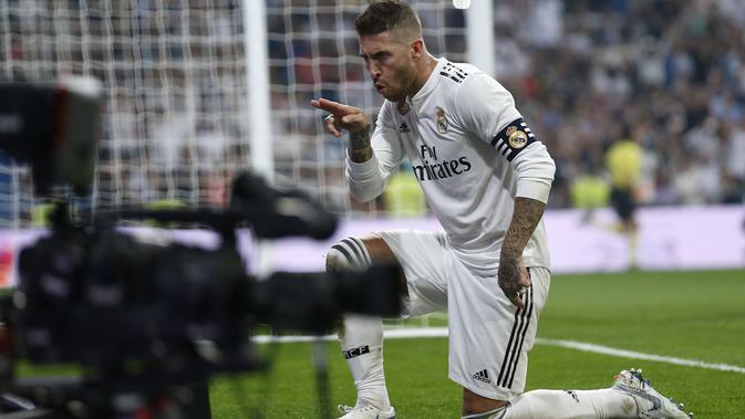 Kapten Real Madrid Serigo Ramo. (AP Photo/Andrea Comas)