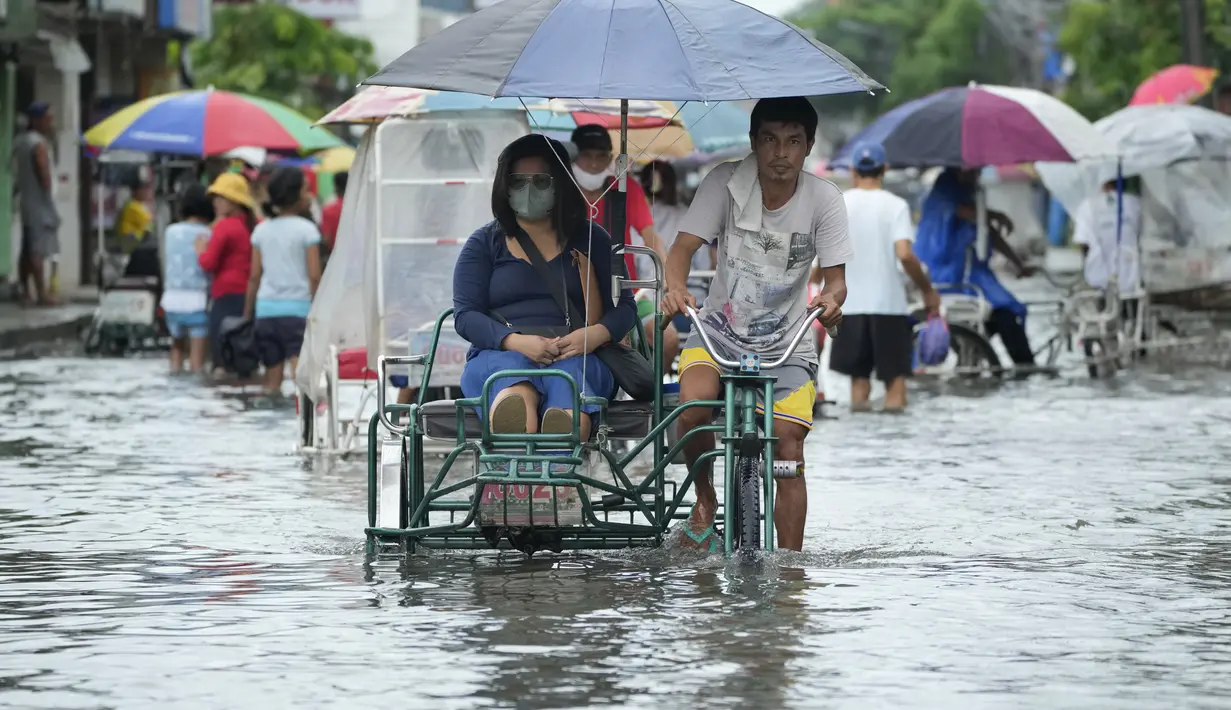 Seluruh wilayah terdampak masih bisa dilalui semua jenis kendaraan. (AP Photo/Aaron Favila)