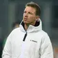 Julian Nagelsmann - Pelatih berusia 34 tahun ini mengawali kariernya sebagai pelatih tim junior 1899 Hoffenheim pada 2010. Pada saat yang sama, Ralf Rangnick duduk di kursi pelatih tim senior Hoffenheim. Juru taktik Bayern ini pun mengaku banyak mendapatkan ilmu dari Rangnick. (AFP/Christof Stache)