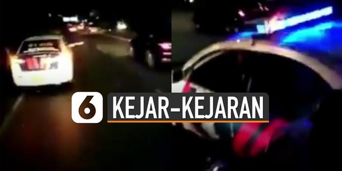 VIDEO: Viral Kejar-Kejaran Mobil Polisi dengan Truk di Tol