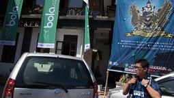 Seorang pendukung Inter Milan bersiap mengikuti Gathering Nasional Inter Club Indonesia (ICI) IV di Bali, Jumat (28/8/2015). Puncak Gathnas ICI Moratti akan diadakan di Garuda Wisnu Kencana. (Bola.com/Vitalis Yogi Trisna) 