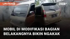 Sebuah mobil mencuri perhatian karena bagian belakang bodynya beda dari bentuk aslinya