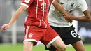 Gelandang Bayern Munchen, Franck Ribery berusaha mengontrol bola dari hadangan bek Liverpool, Alexander Arnold saat bertanding di semifinal Audi Cup di Allianz Arena di Munich, Jerman (1/8). Liverpool menang 3-0 atas Munchen. (Christof Stache/AFP)