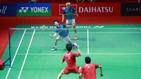 Penampilan sempurna pasangan ganda putra Indonesia, Marcus Fernaldi Gideon/Kevin Sanjaya Sukamuljo pada babak 32 besar Indonesia Masters 2023 di Istora Gelora Bung Karno, Jakarta, Selasa (24/1/2023) sore WIB. (Bola.com/Muhammad Iqbal Ichsan)