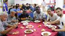Pelatih T-Team, Rahmad Darmawan, dan para pemainnya yang pernah bermain di ISL seperti Makan Konate, Abdoulaye Maiga, dan Rohit Chand, saat makan malam bersama pemain T-Team lainnya, Senin (25/1/2016). (Bola.com/Nicklas Hanoatubun)