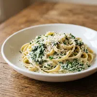 Resep Creamy Spinach Pasta, Menu Praktis untuk Makan Malam Keluarga. (Foto: AI Generated)