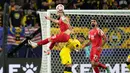 Yordania bermain impresif sepanjang 2x45 menit. Empat gol kemenangan Yordania atas Malaysia diborong oleh dua pemain, masing-masing Mahmoud Al-Mardi dan Musa Al-Tamari. (AP Photo/Aijaz Rahi)