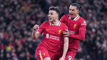 Liverpool harus puas berbagi poin usai bermain imbang dengan Fulham 2-2 dalam laga pekan 16 Premier League 2024/2025 yang digelar di Anfield, Sabtu (14/12/2024) malam WIB. Diogo Jota menjadi penyelamat The Reds setelah mencetak gol penyeimbang di menit 86. (AP Photo/Jon Super)