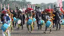 Pasukan drum band TNI dan Polri mengiringi proses kirab. (Liputan6.com/Angga Yuniar)