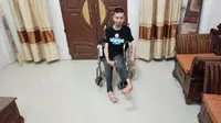 Penyandang disabilitas daksa Khairil Fikri berhasil melakukan perjalanan mudik lebaran idul fitri 2023 seorang diri tanpa pendamping. Foto Dok Pribadi.