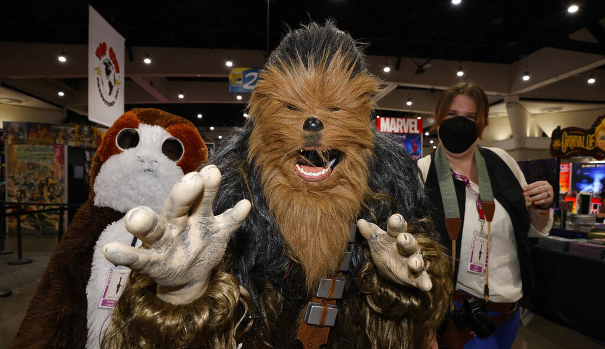 Pengunjung Comic-Con San Diego (Foto: Christy Radecic/Invision/AP)