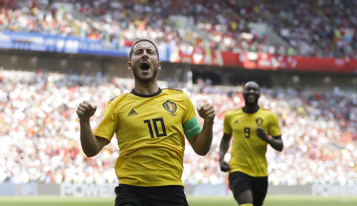 Pemain Eden Hazard mencetak gol lewat titik putih ke gawang Tunisia pada menit ke 6’ pada laga grup G Piala Dunia 2018 di Spartak Stadium, Moskow, Rusia, (23/6/2018). Belgia menang 5-2. (AP/Matthias Schrader)