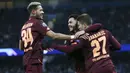 Striker Hoffenheim, Andrej Kramaric, melakukan selebrasi usai membobol gawang Manchester City pada laga Liga Champions di Stadion Etihad, Rabu (12/12). Manchester City menang 2-1 atas Hoffenheim. (AP/Dave Thompson)