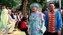 Ratu Denmark Margrethe II didampingi Gubernur DKI Jakarta Basuki T Purnama mengunjungi Ruang Publik Terpadu Ramah Anak (RPTRA) Kenanga di Cideng, Jakarta, Kamis (22/10/2015). (Liputan6.com/Yoppy Renato)