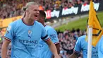 Erling Haaland, striker asal Norwegia yang baru berusia 22 tahun tampil menggila pada musim debutnya di Liga Inggris musim 2022/2023 ini bersama Manchester City. Dari 7 laga awal, ia sudah mengemas 11 gol dan 1 assist bagi The Citizens. Jika terus konsisten dengan penampilannya, bukan tak mungkin ia akan menjadi salah satu pemain Norwegia tertajam yang pernah berlaga di Premier League Liga Inggris dan bergabung dengan 5 pemain berikut ini. (AFP/Geoff Caddick)