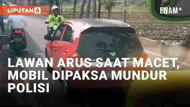 Kemacetan adalah hal yang tidak disukai dan dihindari bagi sebagian pengendara. Tak jarang beberapa oknum pengendara nekat mengambil hak jalan pengendara dari arah berlawanan demi menembus kemacetan. Upaya serupa dilakukan oleh mobil merah yang viral...