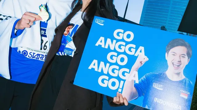 Shenina Cinnamon pakai baju foto Angga Yunanda di Tokyo Marathon. [@shenacinnamon]