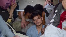 Tindakan keras terhadap para migran tidak berdokumen sebagian besar mempengaruhi sekitar dua juta warga Afghanistan yang tinggal di Pakistan tanpa dokumen. (AP Photo/Arshad Butt)