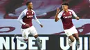 Pemain Aston Villa, Ollie Watkins, melakukan selebrasi usai mencetak gol ke gawang Liverpool pada laga Liga Inggris di Stadion Villa Park, Minggu (4/10/2020). Liverpool takluk dengan skor 7-2. (Peter Powell/Pool via AP)