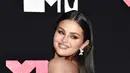 Sedangkan untuk rambutnya Selena Gomez membiarkan tergerai namun tetap terlihat sleek. (Photo by Evan Agostini/Invision/AP)