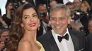 Rona bahagia menyelimuti pasangan George Clooney dan Amal Almuddin. Pasalnya keduanya baru saja dikaruniai anak pertama mereka. Hal membahagiakan lainnya adalah mereka mendapat sepasang anak kembar. (AFP/Bintang.com)