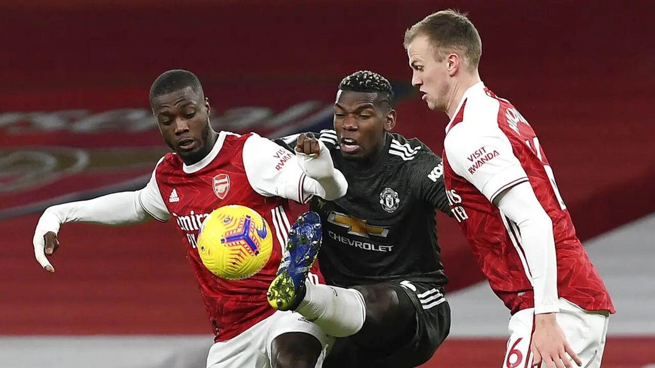 FOTO: Tertahan di Markas Arsenal, Manchester United Semakin Menjauh dari Manchester City di Puncak Klasemen