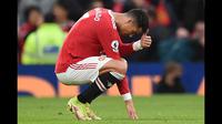 Skor 0-5 untuk kekalahan Manchester United bertahan hingga pertandingan usai. Hasil itu benar-benar menjadi tragedi pahit bagi MU di Old Trafford. (AFP/Oli Scarff)