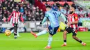 Selain itu, tim asuhan Mikel Arteta mampu melepaskan 14 tembakan dengan 5 di antaranya mengarah tepat ke gawang Brentford. (AP Photo/Kirsty Wigglesworth)