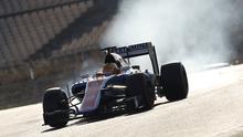 Pebalap Manor Racing, Rio Haryanto, seusai menjalani tes pramusim Formula 1 di Sirkuit Catalunya, Spanyol, Rabu (24/2/2016). (Reuters/Sergio Perez).