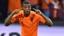 Selebrasi gelandang Timnas Belanda, Georginio Wijnaldum setelah mencetak gol ke gawang Timnas Jerman pada laga UEFA Nations League di Johan Cruijff ArenA, Amsterdam (13/10/2018). Georginio Wijnaldum mencetak satu gol dalam laga debutnya bersama Timnas Belanda saat menang 11-0 atas San Marino pada ajang kualifikasi Euro 2012 (2/9/2011). Pemain yang tengah dipinjamkan PSG ke AS Roma ini total telah mengoleksi 88 caps dengan raihan 26 gol dan 9 assist. (AFP/Emmanuel Dunand)