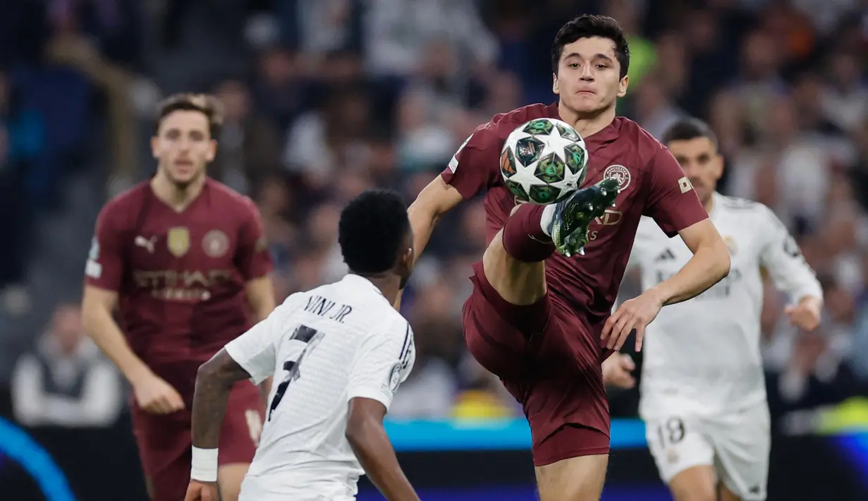 Real Madrid menutup babak pertama dengan keunggulan 2-0 atas Manchester City. (OSCAR DEL POZO/AFP)