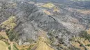 Foto udara menunjukkan kerusakan usai kebakaran hutan di dekat kota pesisir Mediterania Manavgat, Antalya, Turki, Jumat (30/7/2021). Korban tewas dalam kebakaran hutan tersebut menjadi empat orang saat kebakaran terjadi. (AP Photo)