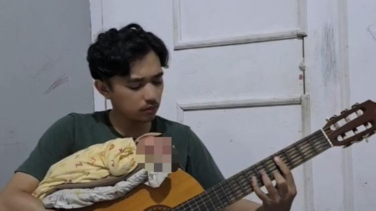 Momen Ayah Taruh Bayi Baru Lahir di Atas Gitar Sambil 'Genjreng' Ini Viral, Banjir Komentar Warganet